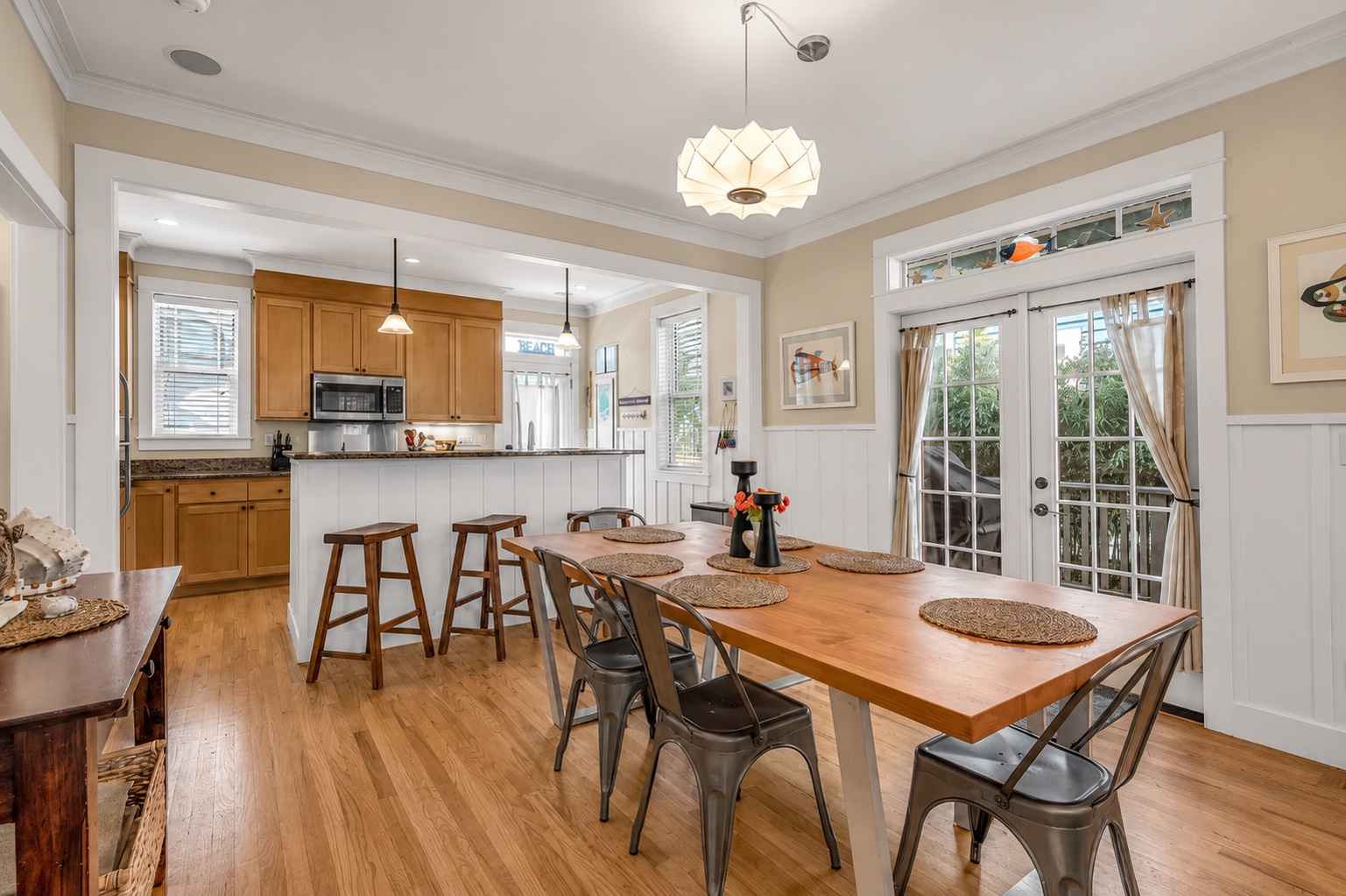 Dining room with chandelier and French doors