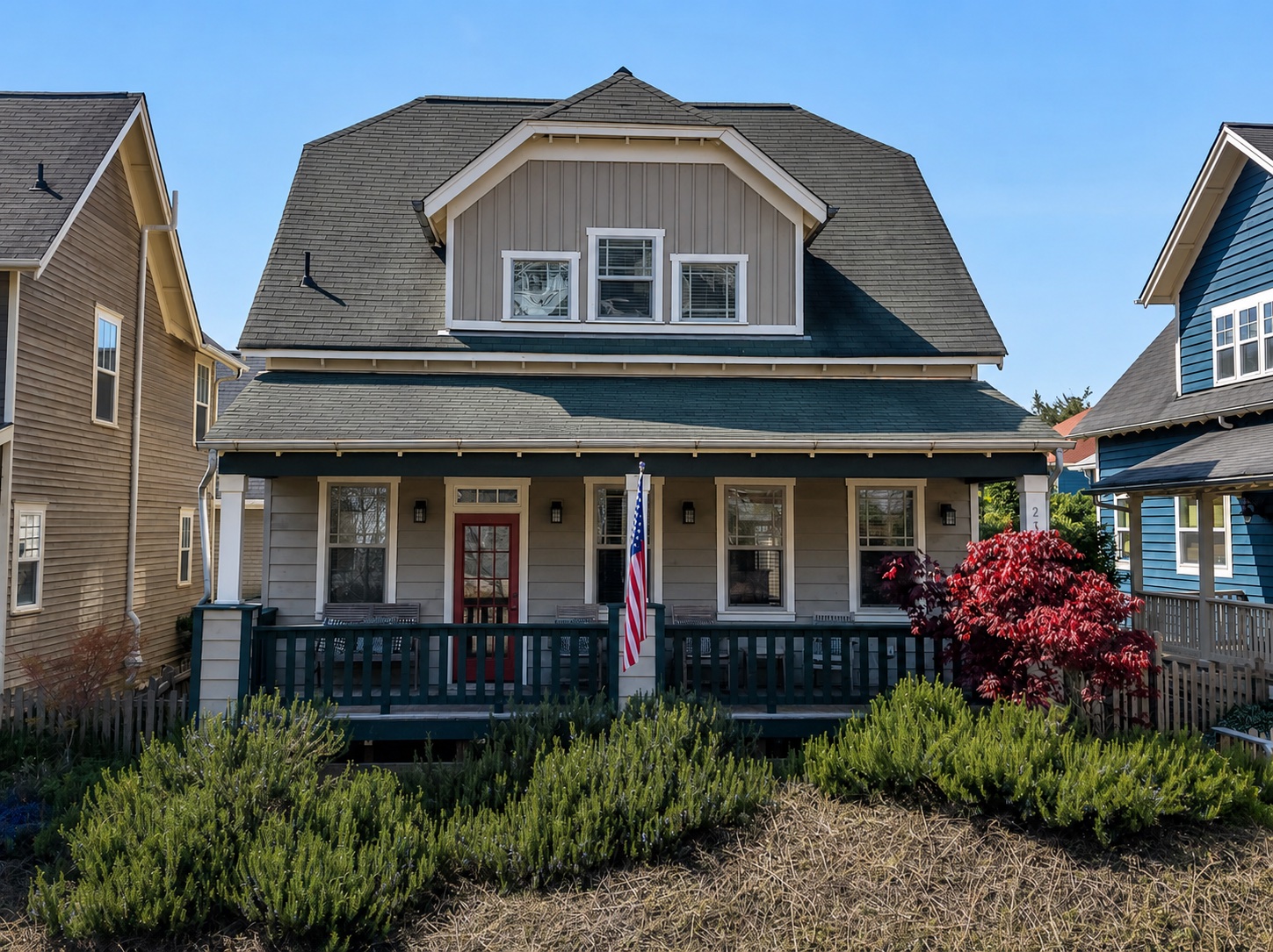 Barnacle Bay front exterior with porch and flag
