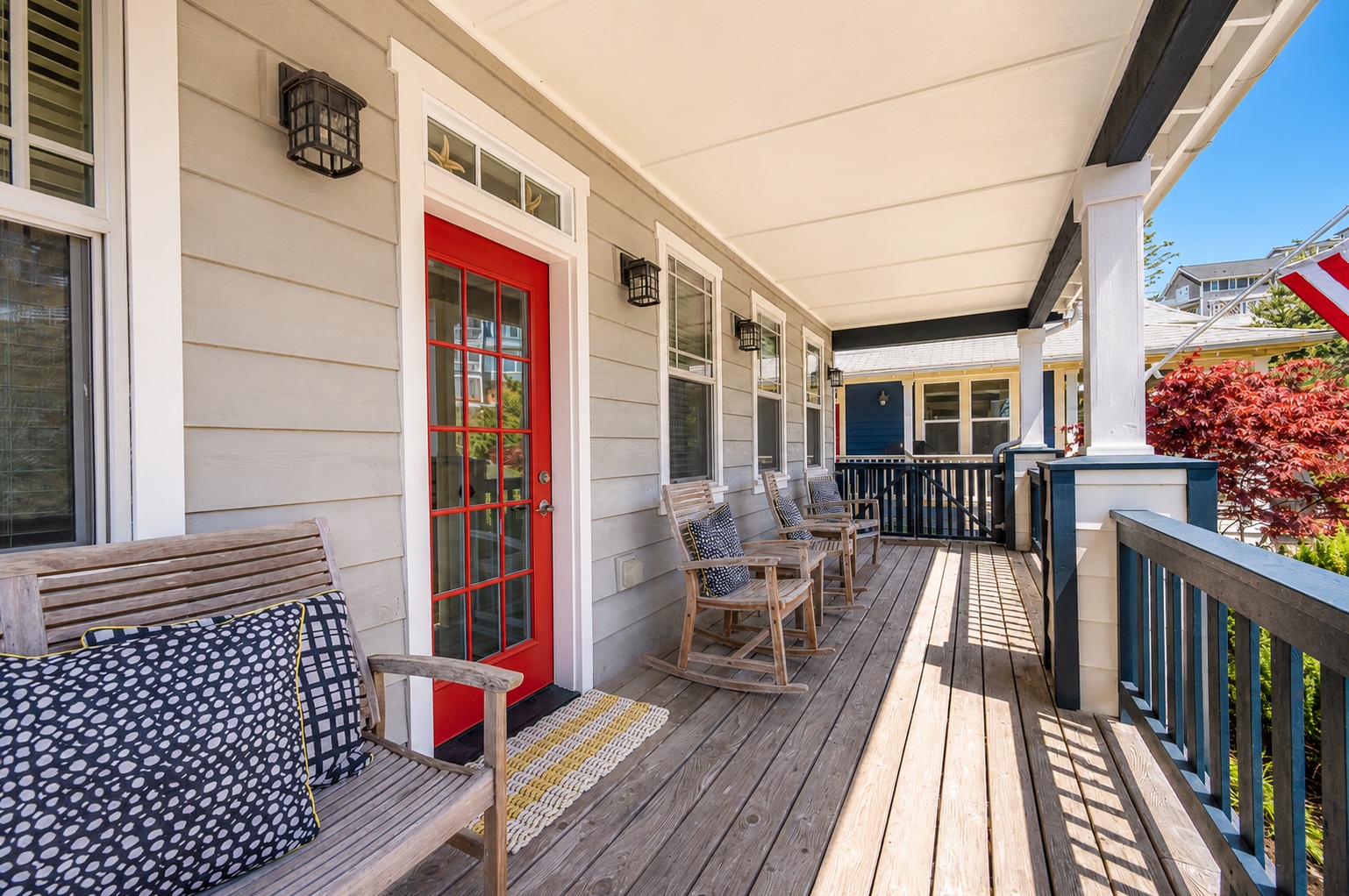 Wrap-around porch with red door