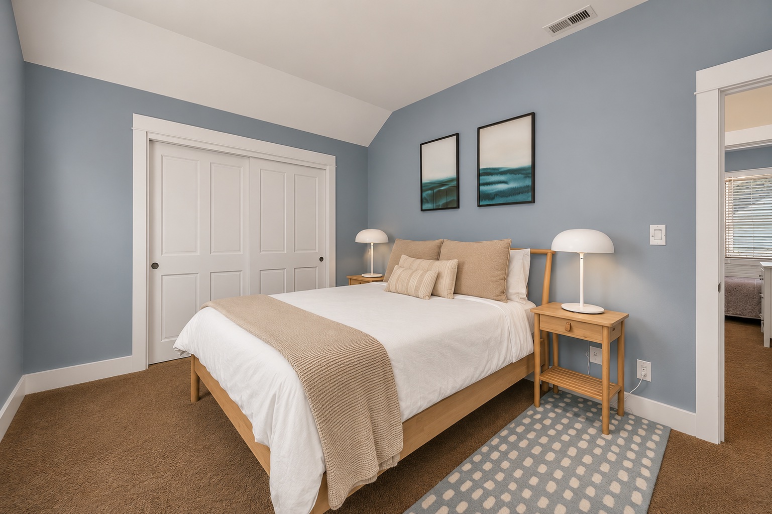 Upper-level queen bedroom