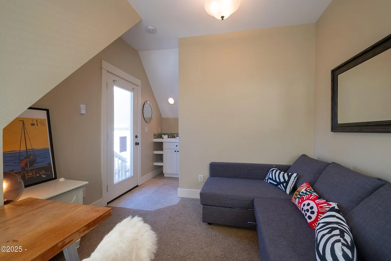 Detached carriage house interior with sofa sleeper
